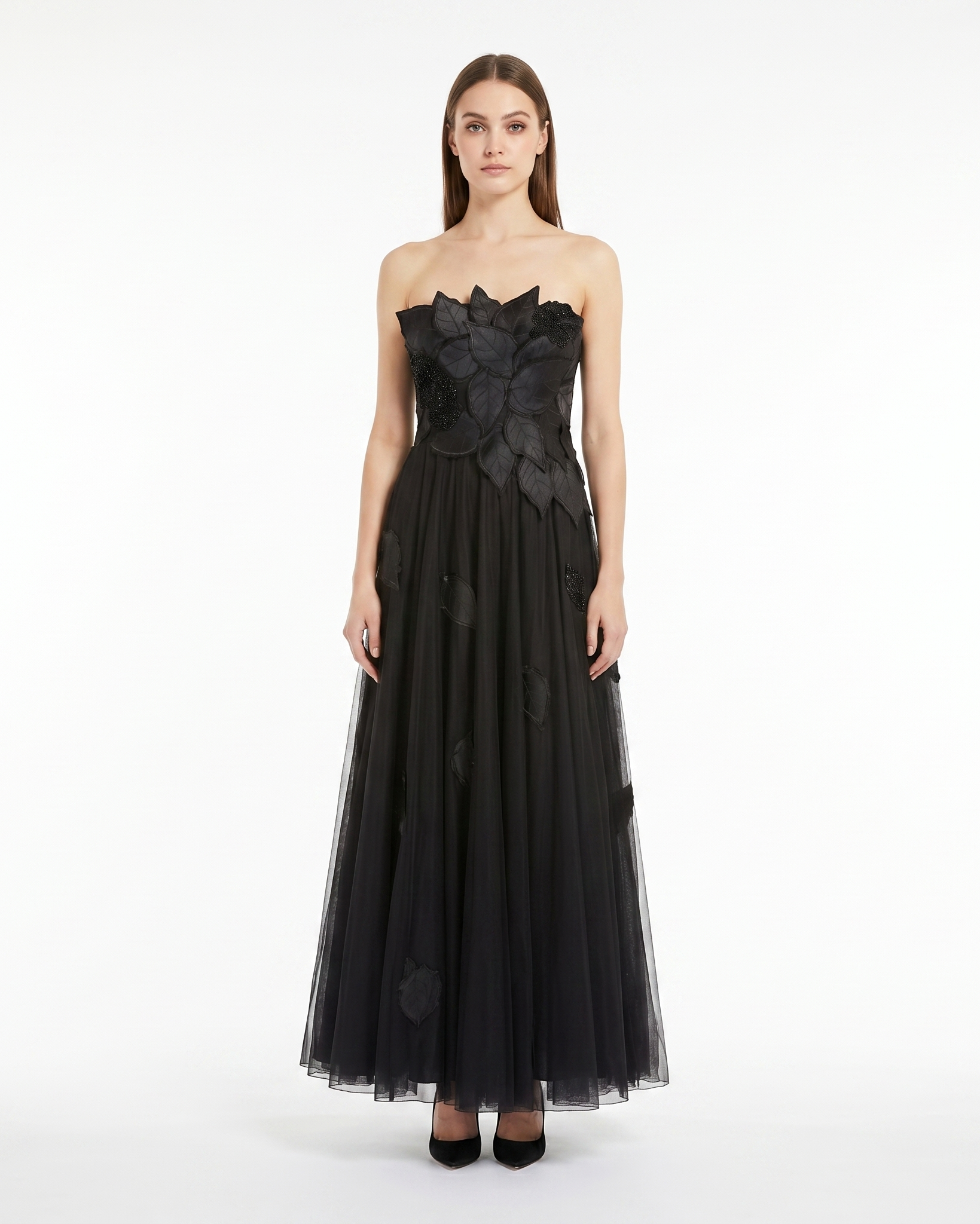 Black strapless gown with floral details on a white background
